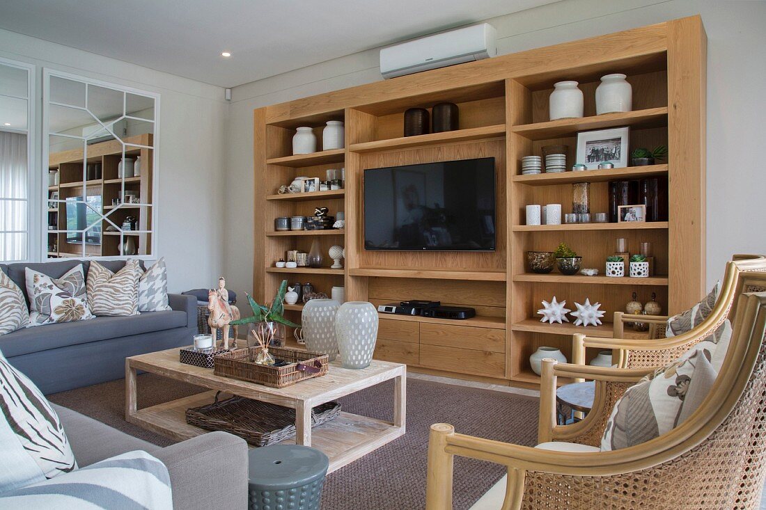 Open shelving with integrated TV in living area