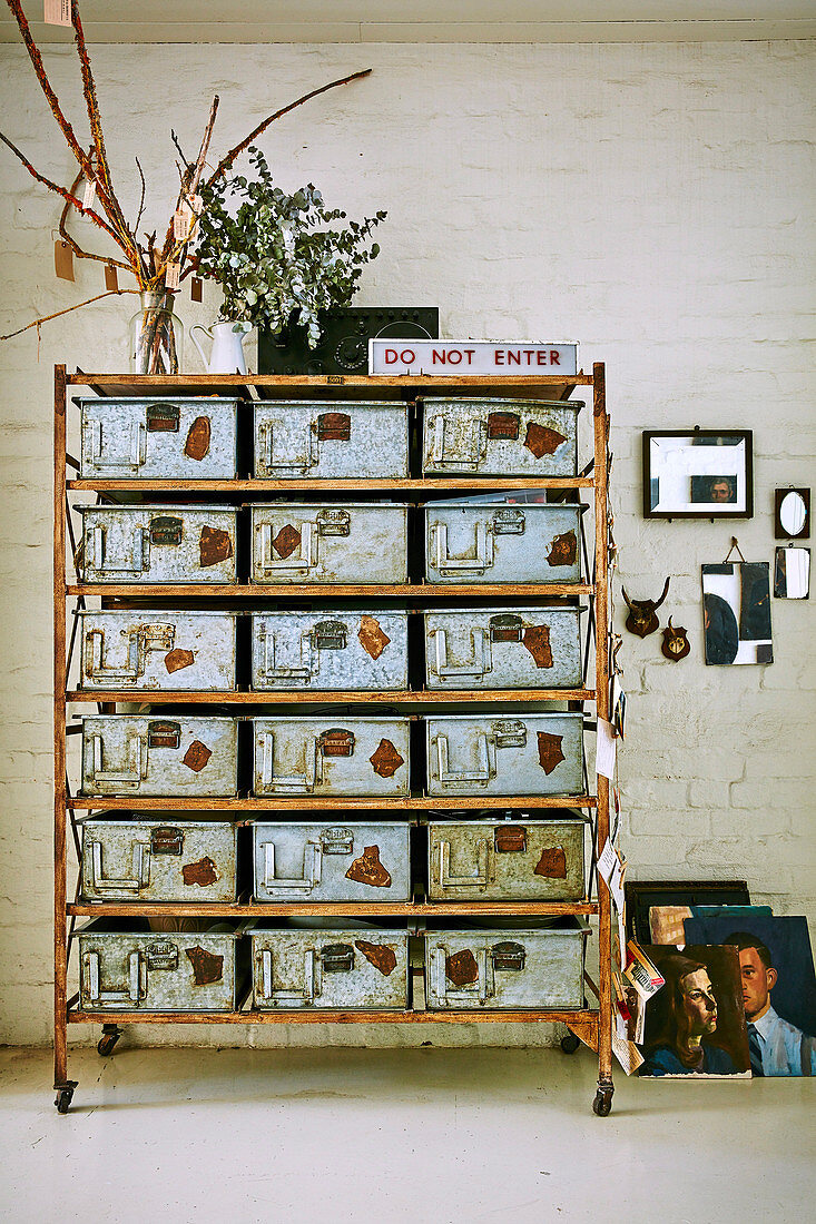 Rollable shelf with vintage metal boxes