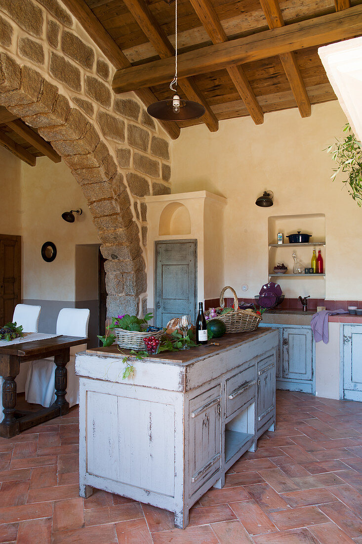 Herringbone brick floor in Mediterranean country-house kitchen