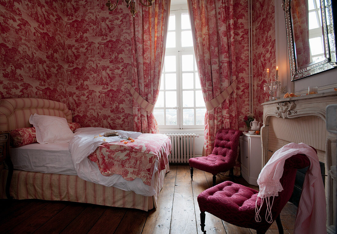 Red and white toile de jouy pattern in historical bedroom