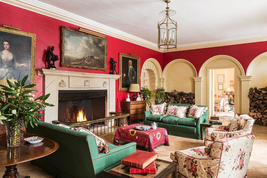 Classic living room in red and green in Cornwell Manor