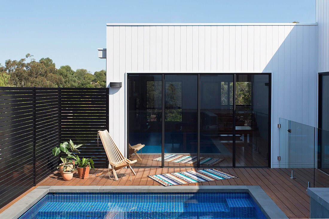 Terrace with pool and wooden deck