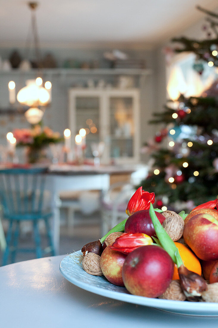 Fruit bowl in festive dining room