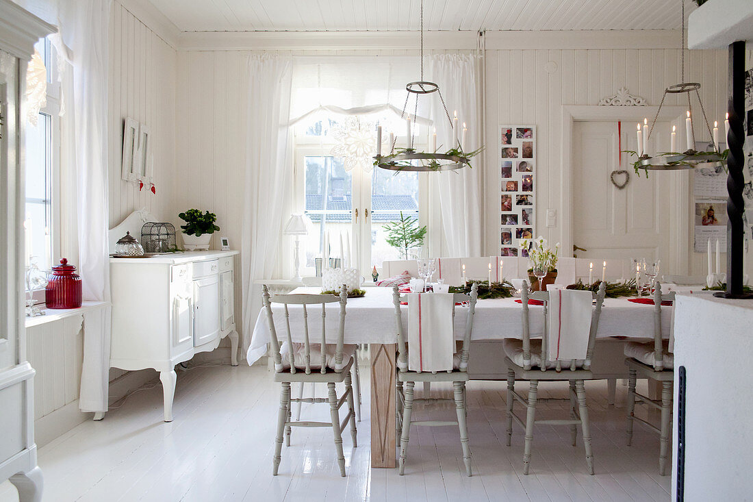 Table set for Christmas in Scandinavian dining room