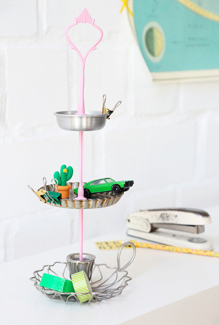 DIY cake stands made from recycled cake tins and candlestick