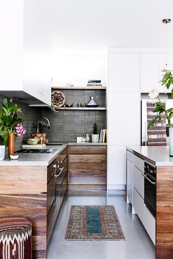 Modern kitchen with natural wooden fronts and boho flair