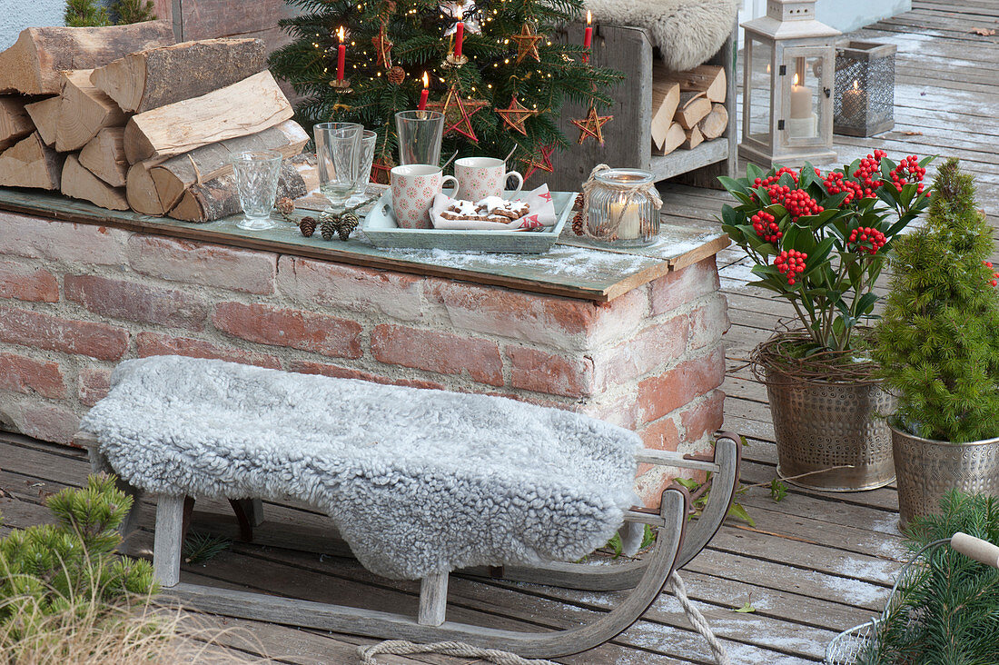 Sled as a seat on the Christmas terrace