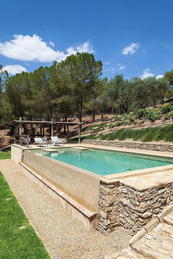 Elegant swimming pool in Mediterranean garden