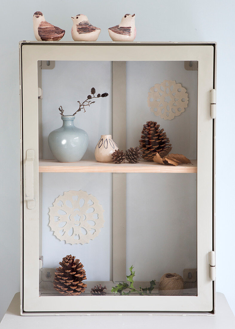 Showcase cabinet with winter decoration
