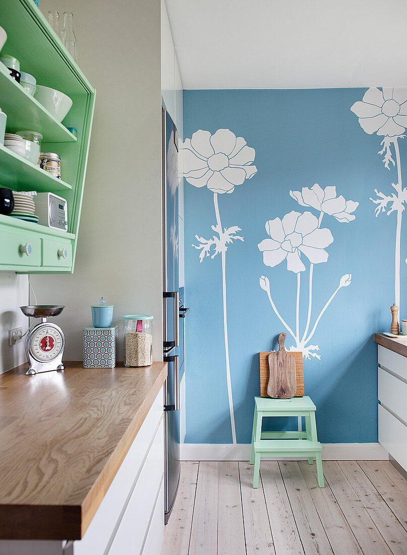 Blue floral wallpaper in a kitchen
