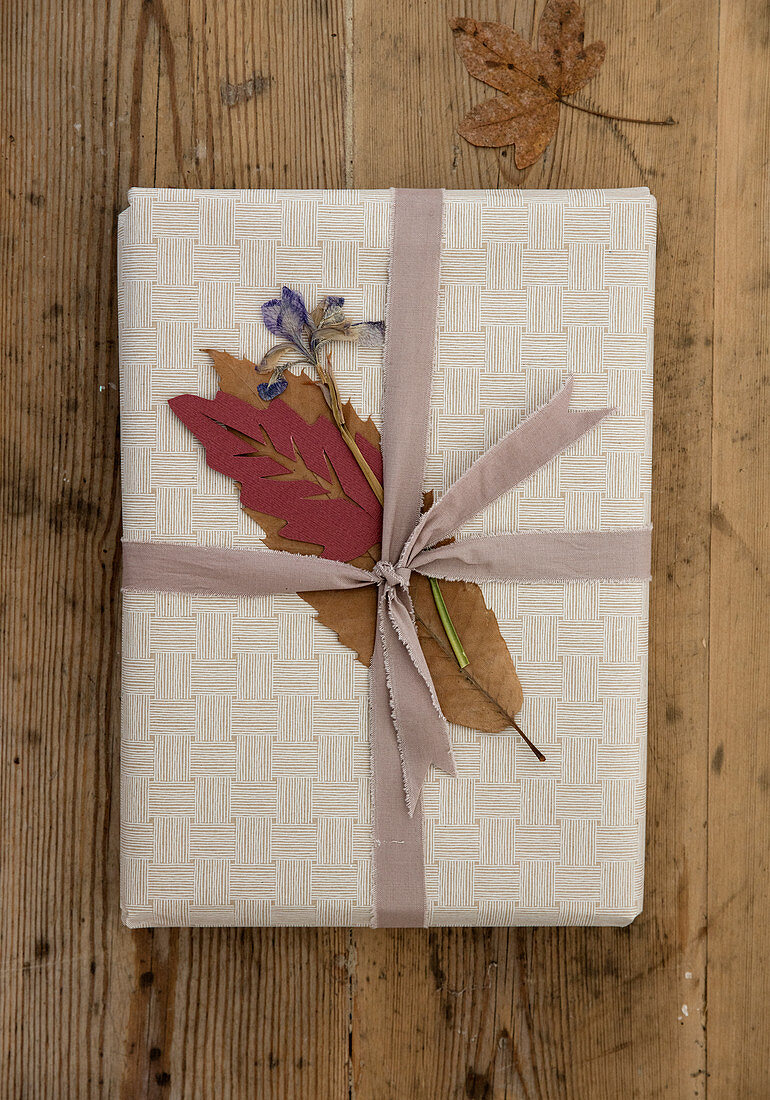 Gift decoration of pressed leaves and flowers