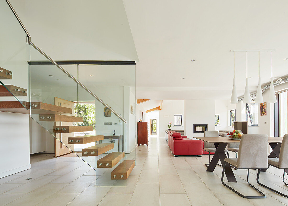 Floating stairs in modern, open-plan interior