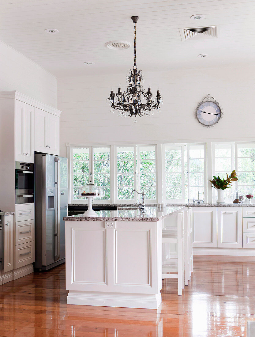 Bright, light-flooded kitchen with kitchen island in a renovated Queenslander