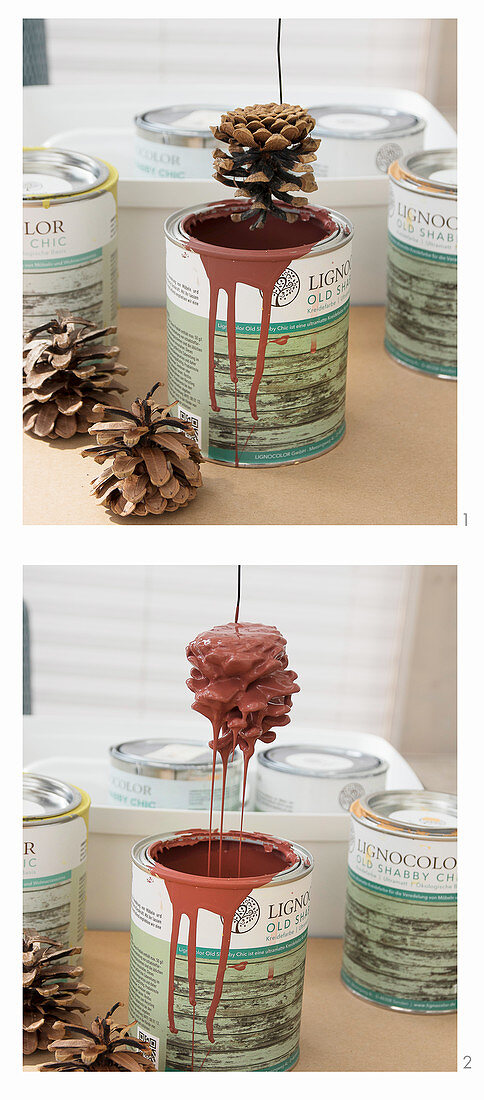 Dipping pine cones in paint