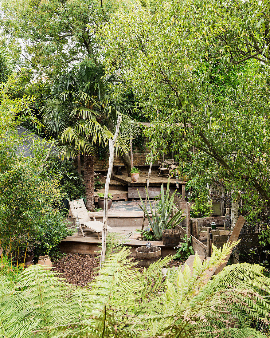 Split-level terrace in lush garden