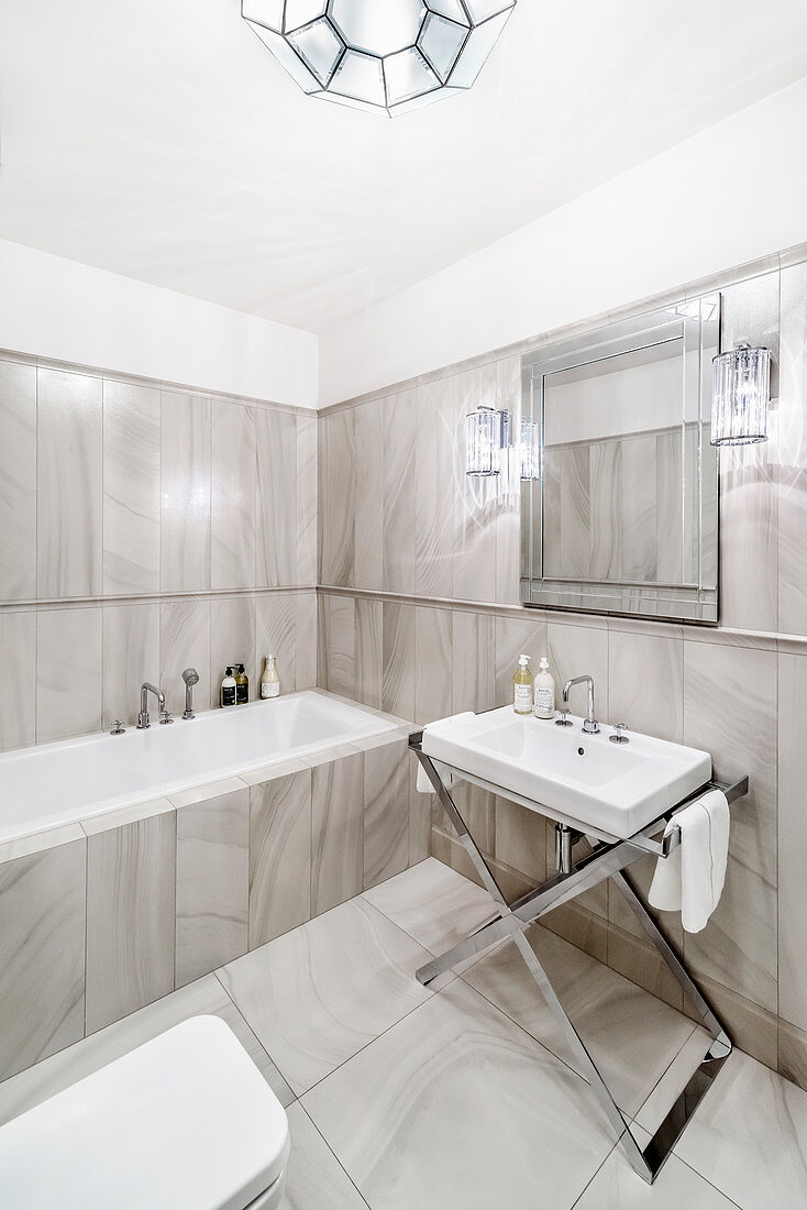 Luxurious bathroom with marble tiles