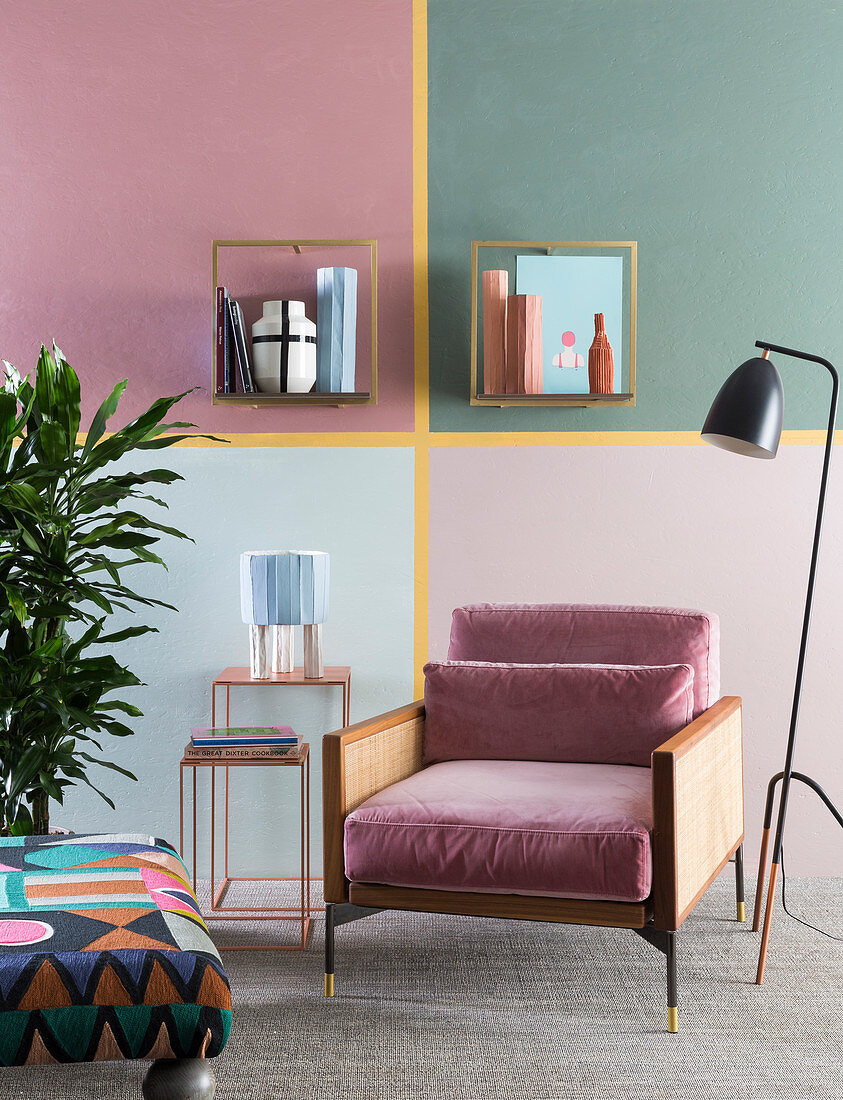 Wall divided into four by washi tape, side table, armchair and standard lamp