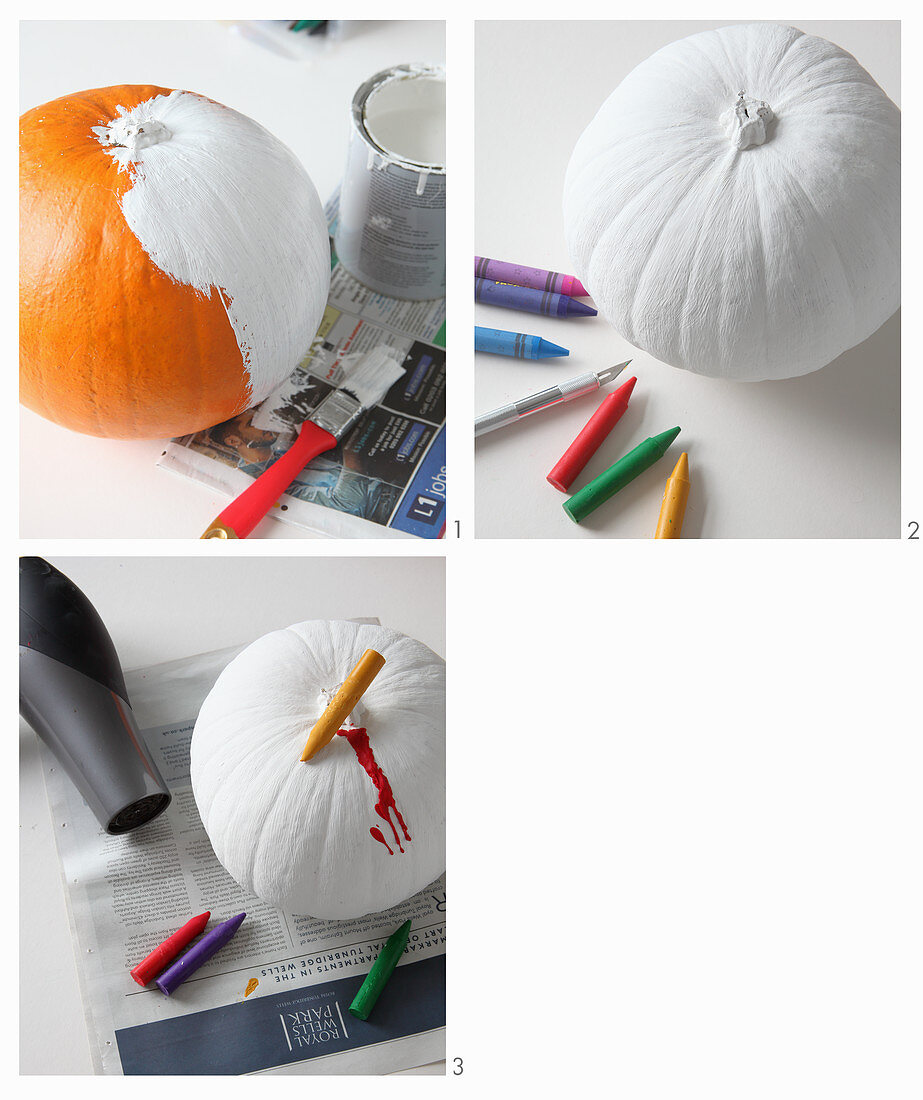 DIY-Halloweendekoration: Kürbisse weiß anmalen und mit buntem Wachs verzieren