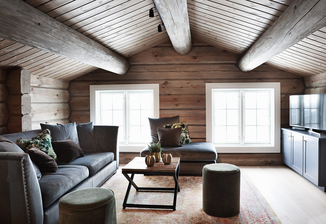 Attic living room in log cabin