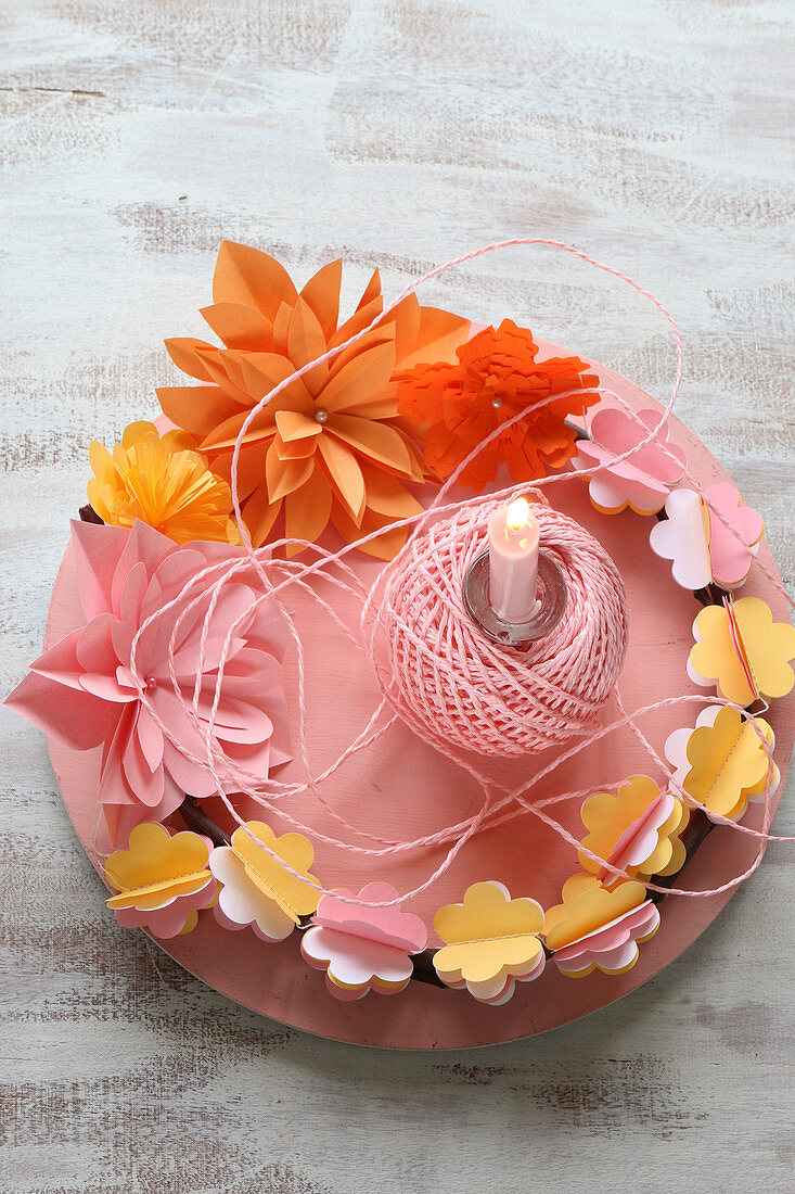 Wreath of pink, orange and yellow paper flowers