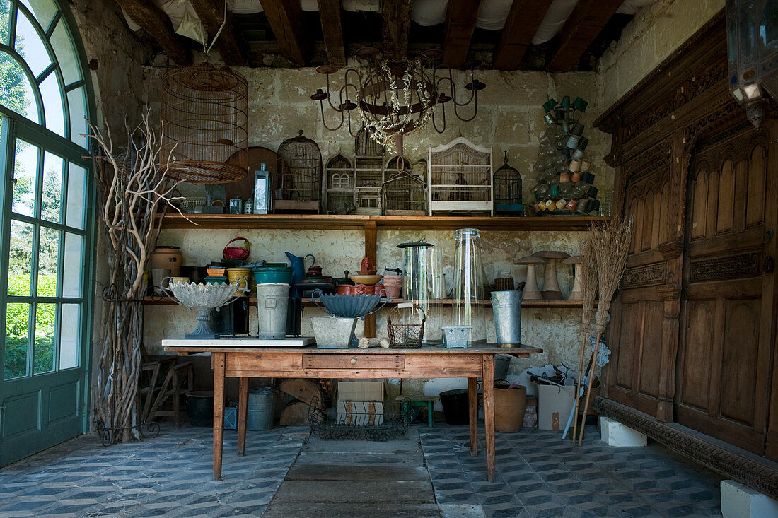 Antique gardening equipment and vintage accessories in summerhouse