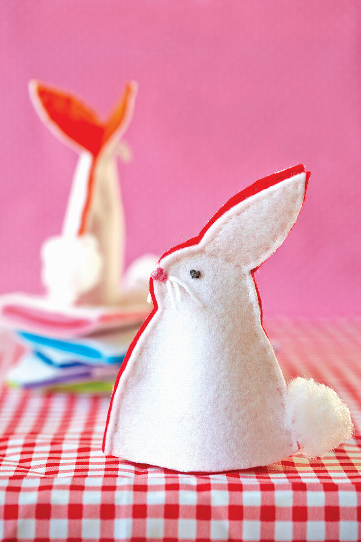 Handmade, two-tone, felt bunny egg warmer