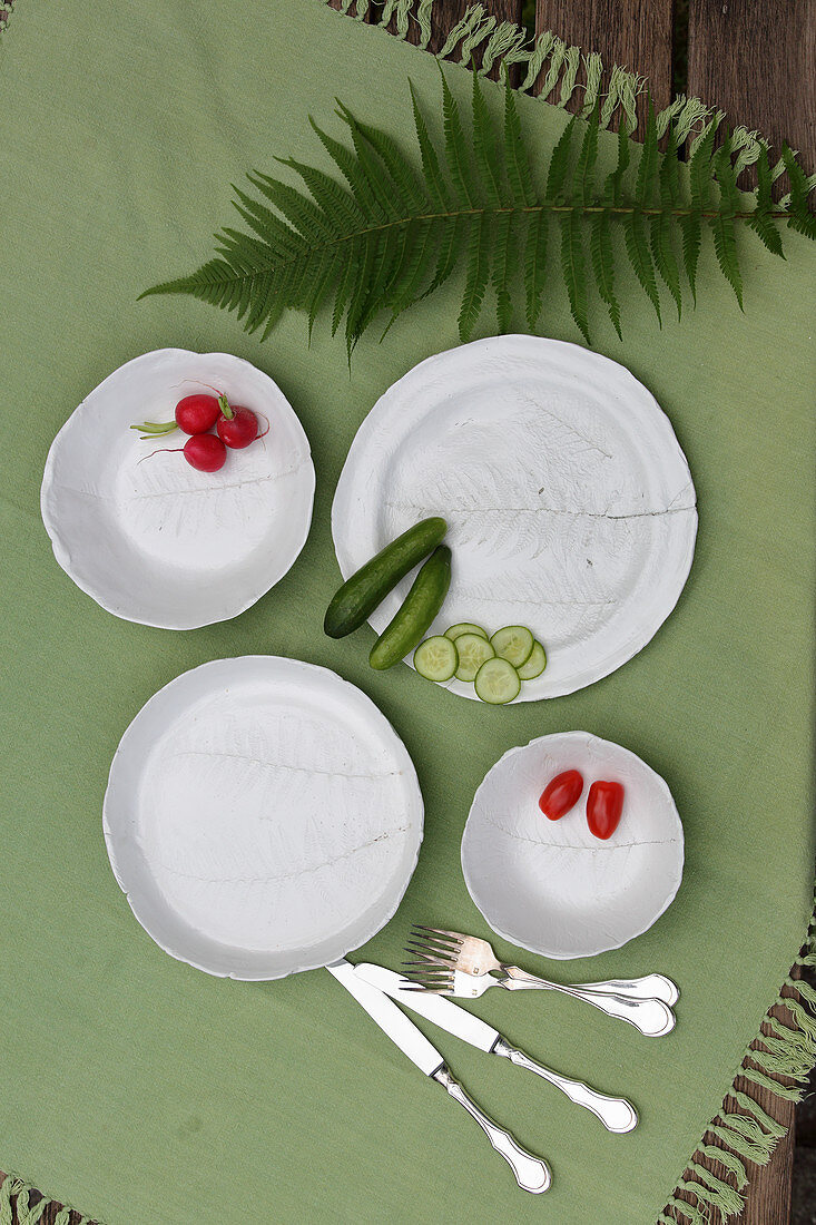 Plates decorated with fern motifs