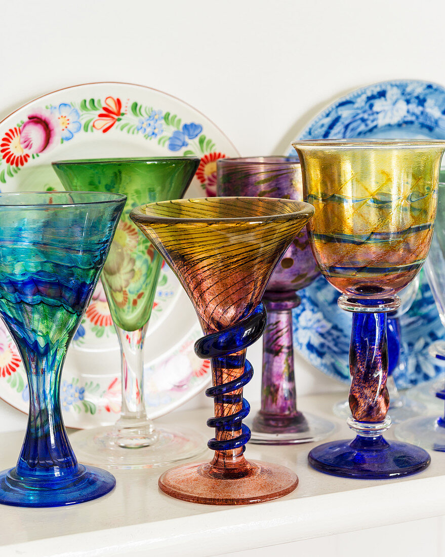 Old wine glasses made from coloured glass