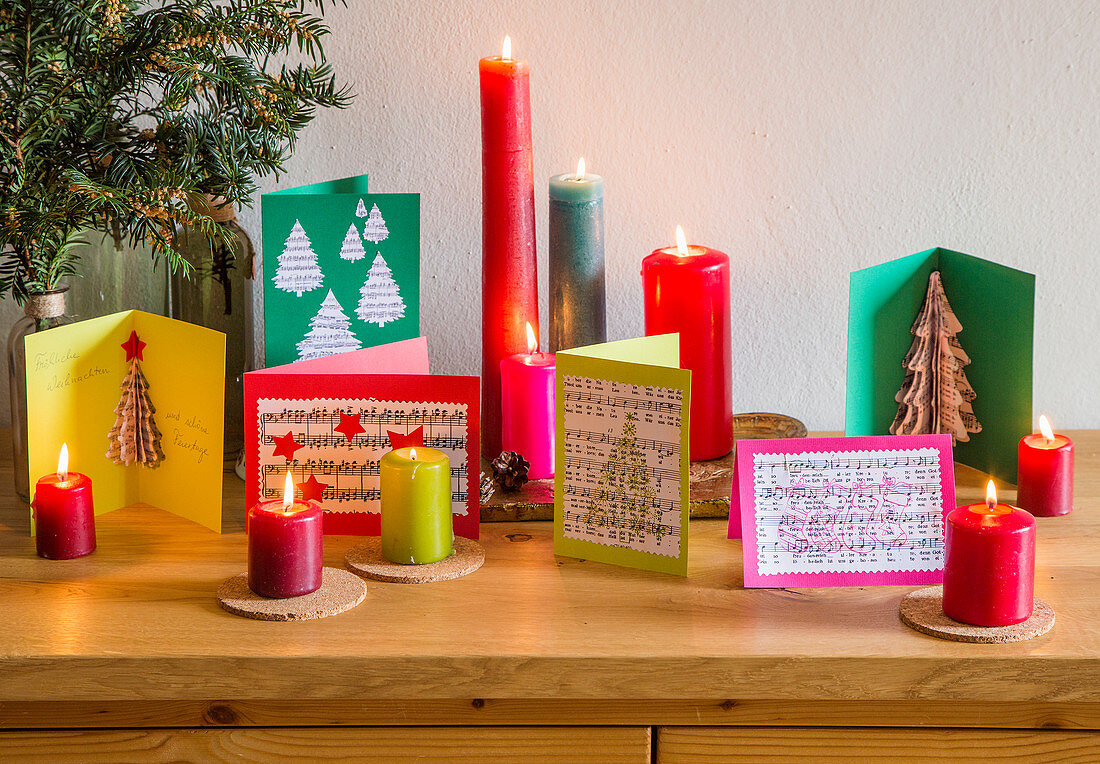 Handmade Christmas cards with motifs made from recycled paper