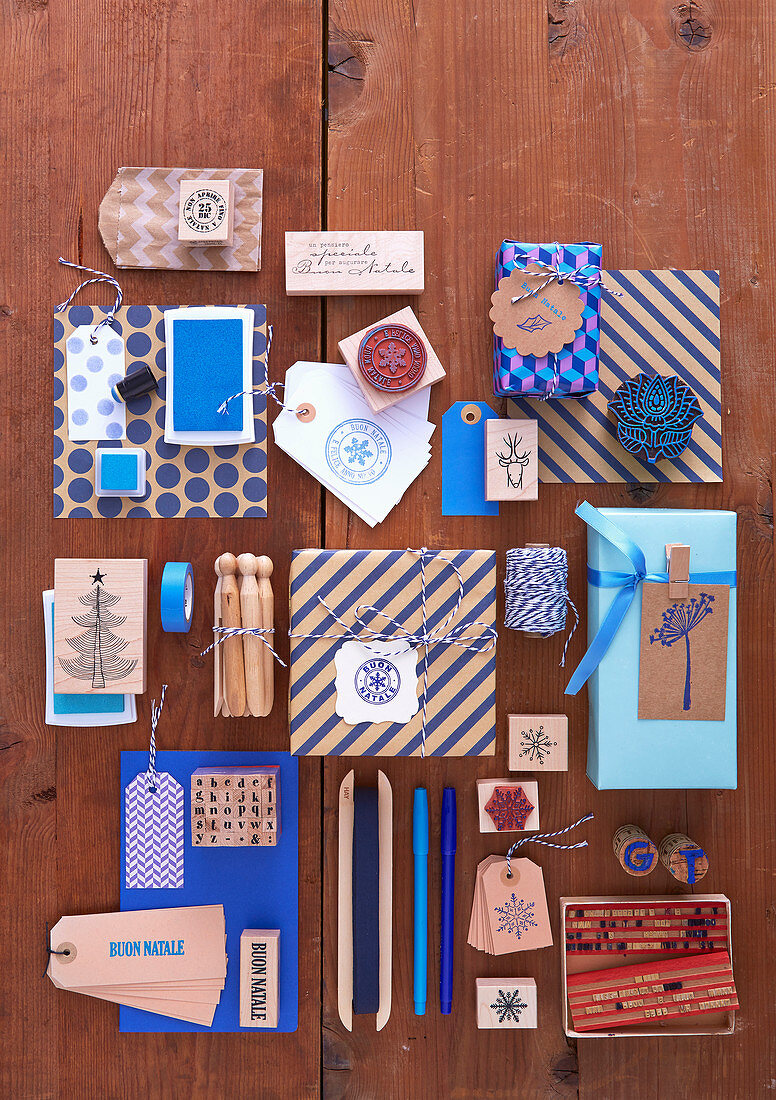 Christmas mood board with gifts wrapped in blue and brown