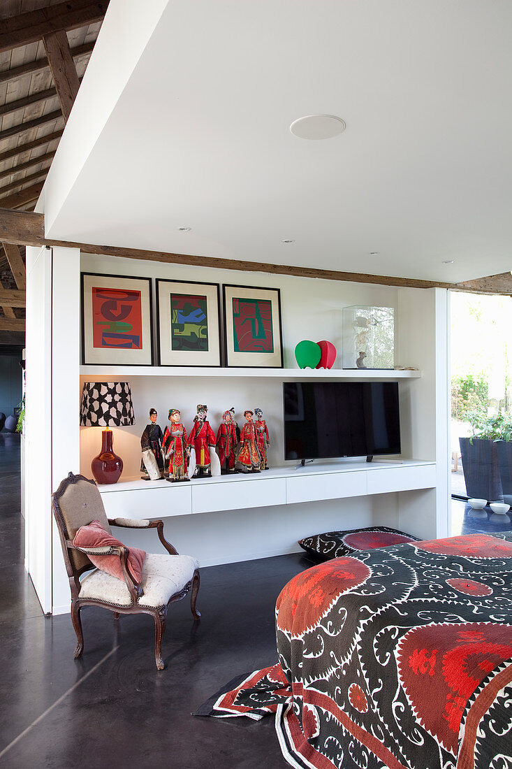 Console table in bedroom with modern architectural elements