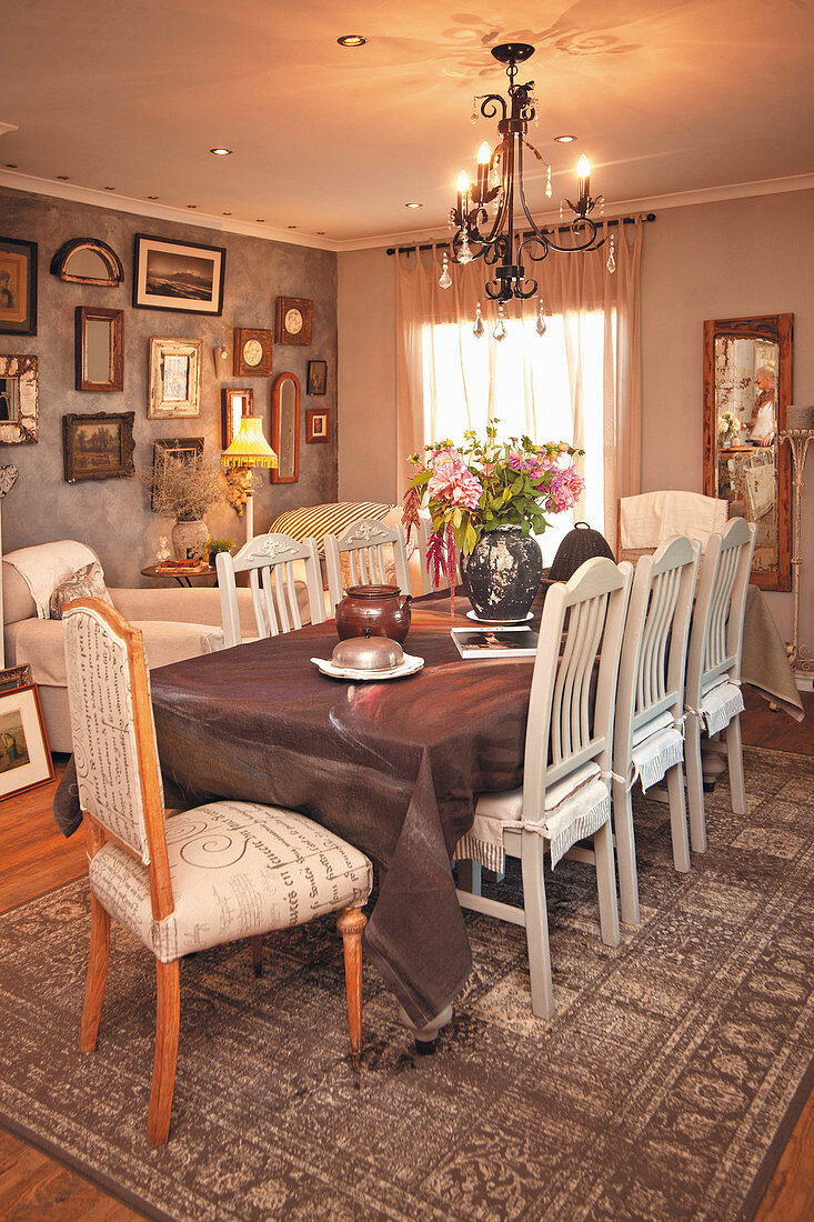French-style dining room with gallery of vintage pictures