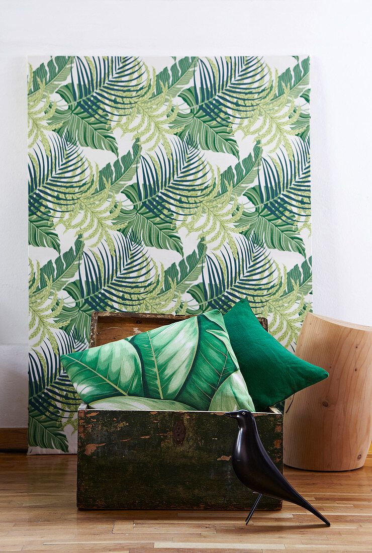 Cushions and artwork in Urban Jungle style