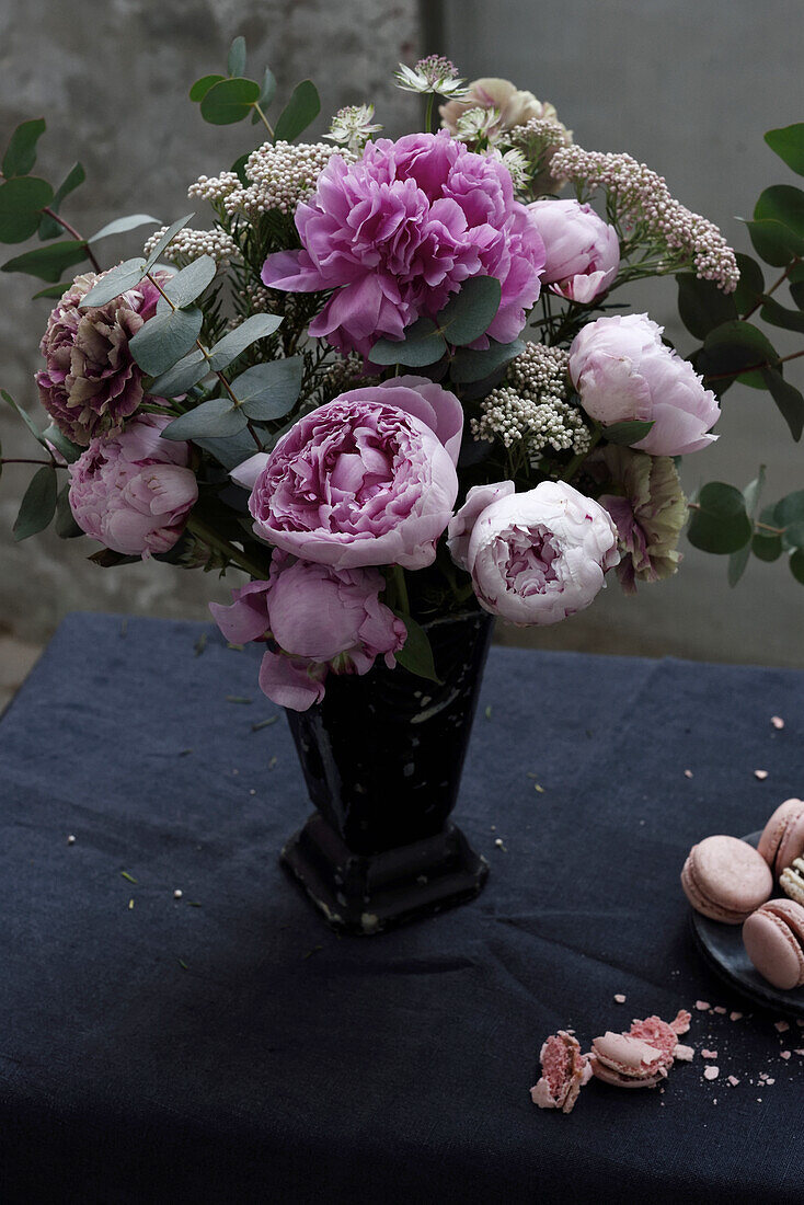 Bouquet of peonies, blue throatwort, and eucalyptus