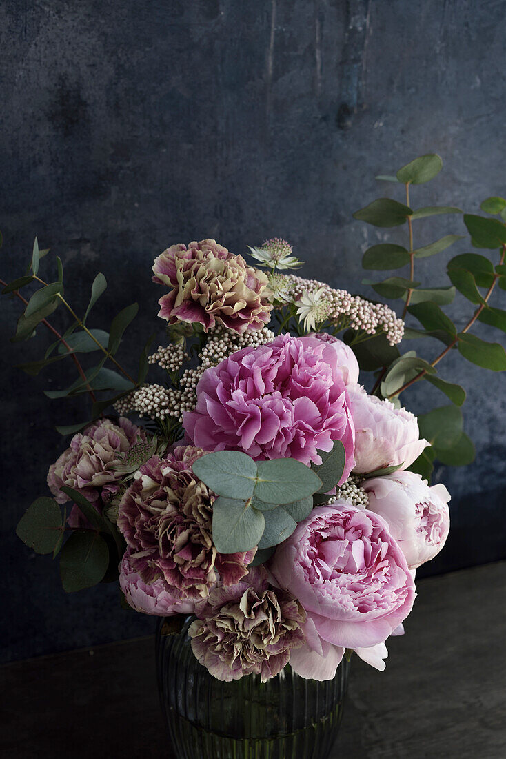 Bouquet of peonies, cervid and eucalyptus