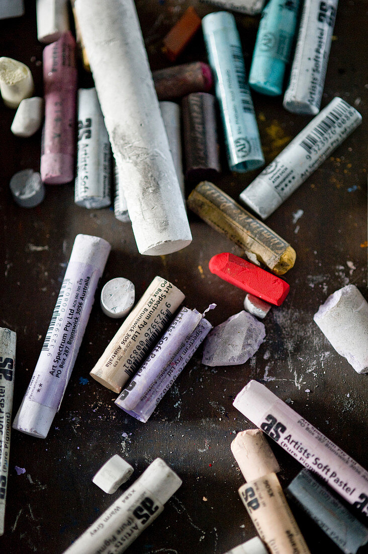 Colourful chalks on table