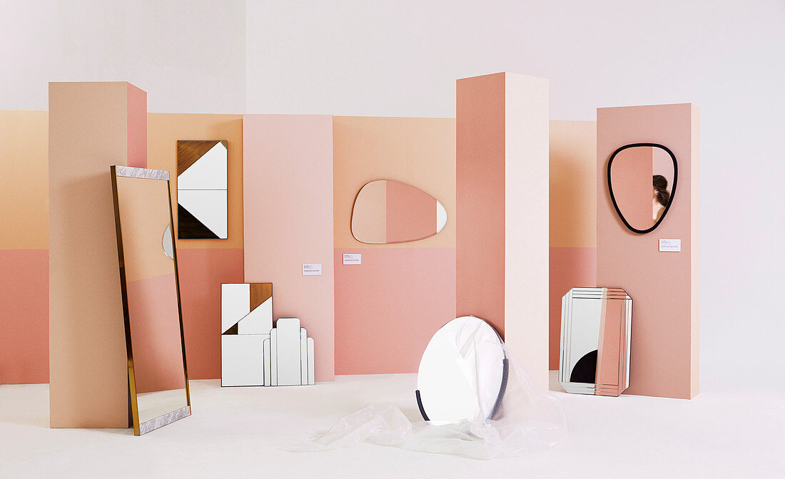 Different mirrors on pink panels