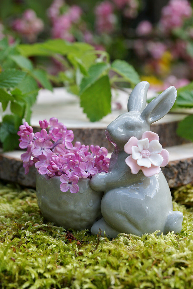 Easter bunny with lilac flowers