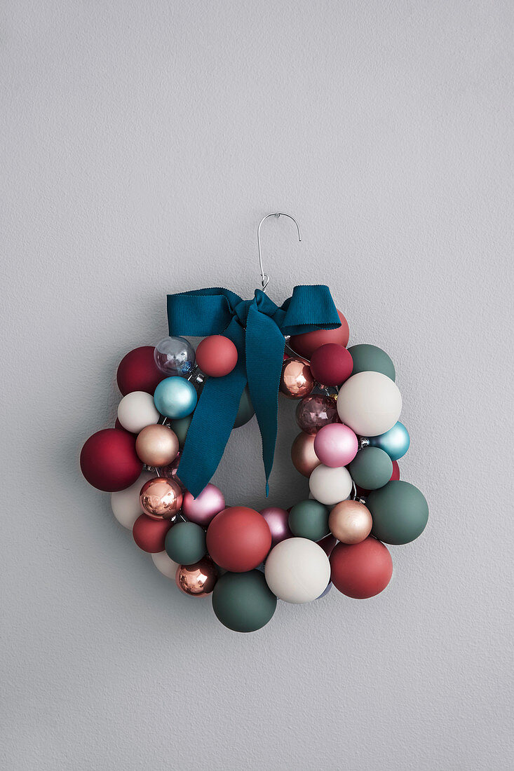 DIY wreath made from coat hanger and baubles