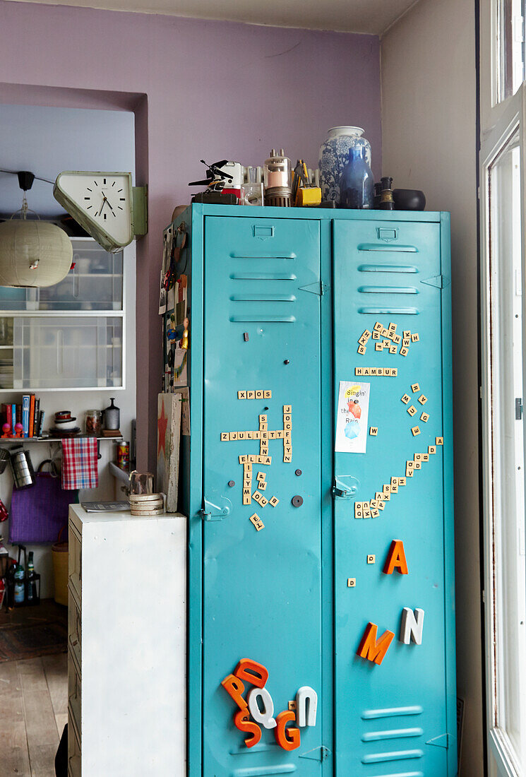 Turquoise blue locker with decorative letter magnets