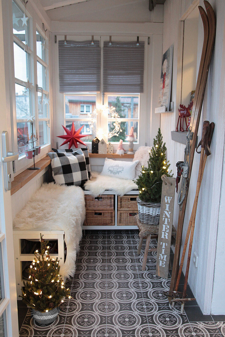Benches and wintry decorations in porch