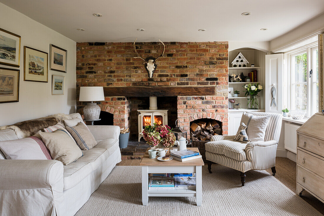 Living room in English country-house style with brick wall
