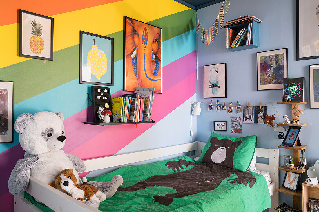 Rainbow colours on wall of child's bedroom