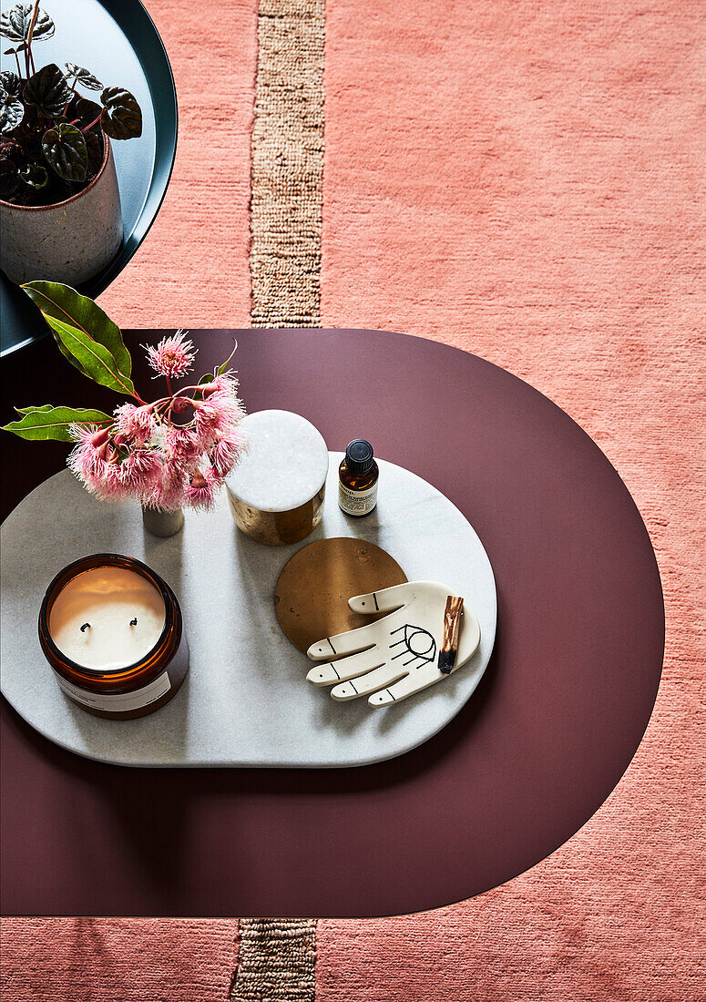 Coffee table on salmon coloured carpet