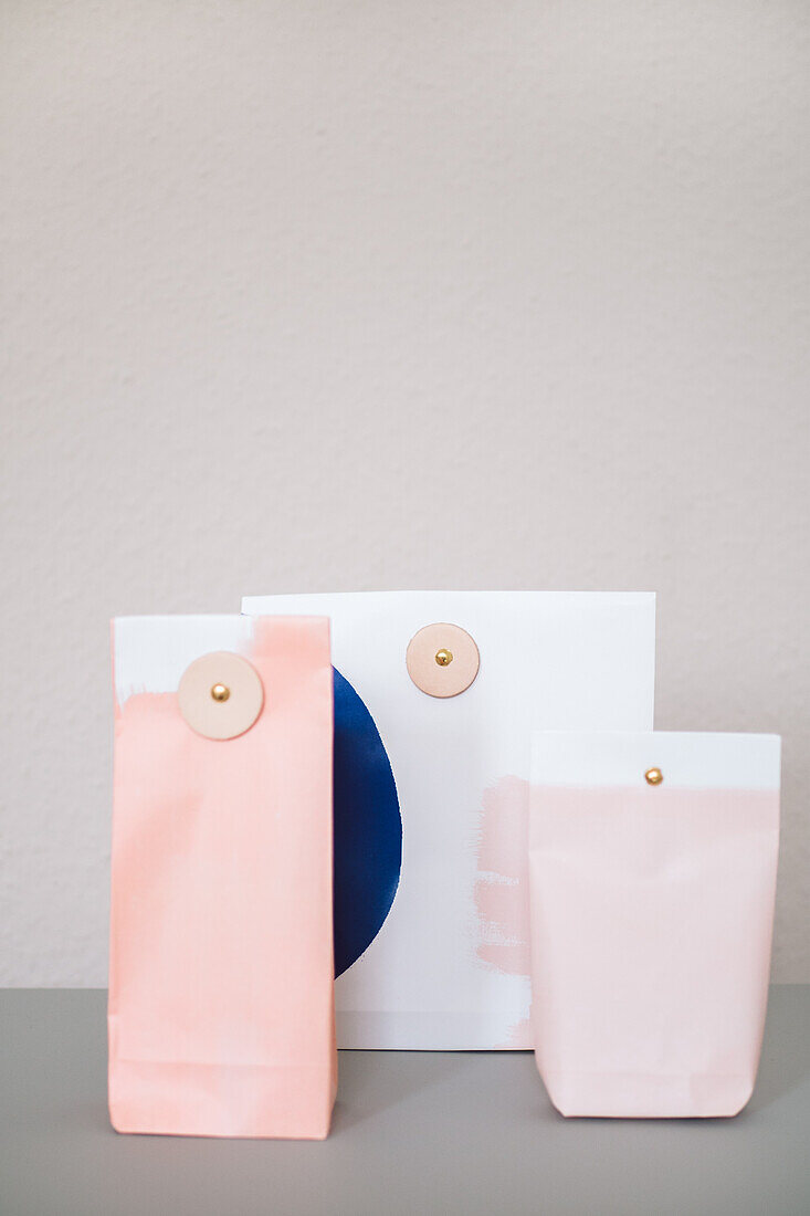 DIY paper gift bags with leather closure