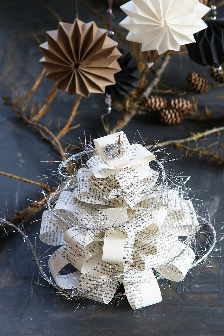 Craft idea with Christmas tree made from old book pages
