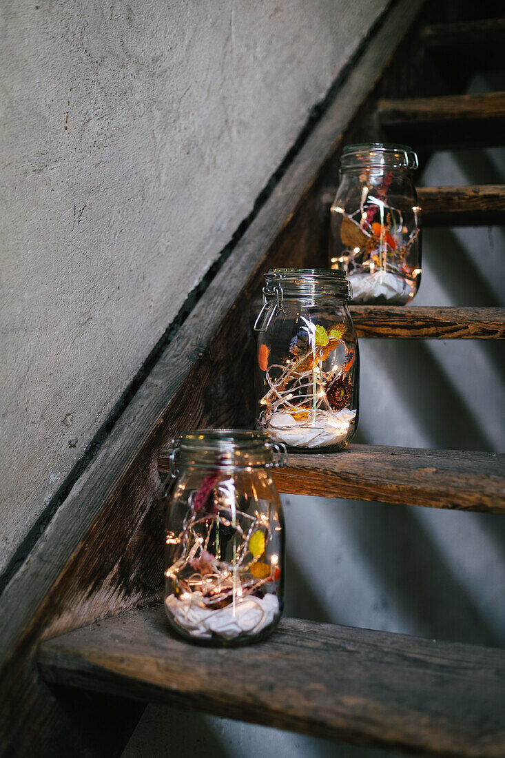 DIY lanterns with dried flowers and fairy lights