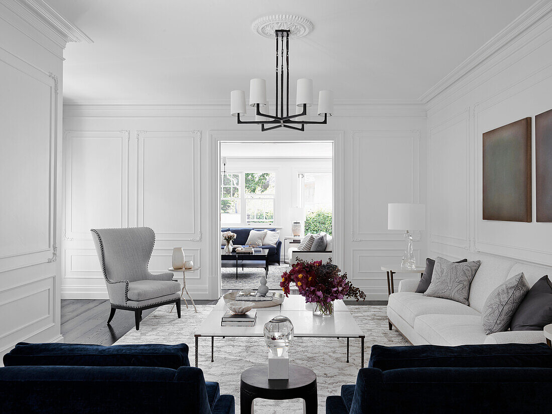 Upholstered furniture in blue, white and grey in the living room