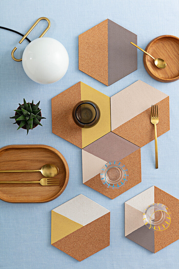 Hexagonal cork coasters painted with graphic pattern