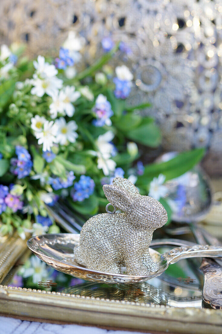 Silver Easter bunny on a silver spoon